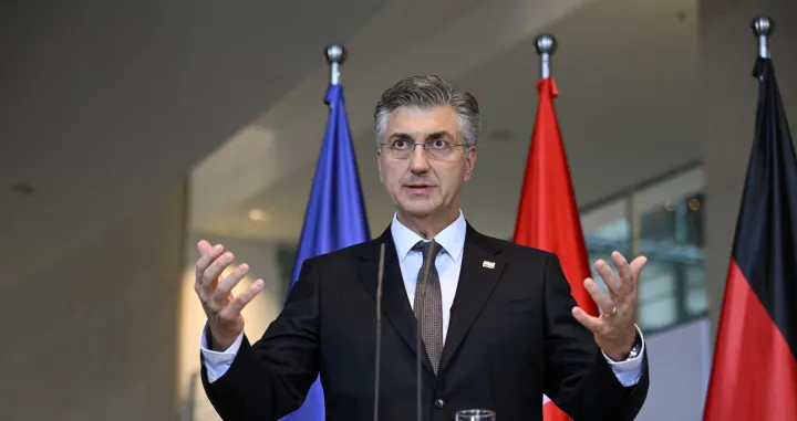 Croatian Prime Minister Andrej Plenkovic speaks during a press conference with German Chancellor Friedrich Merz at the Chancellery in Berlin, Germany December 10, 2025. REUTERS/Annegret Hilse/Annegret Hilse