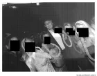 U.S. President Donald Trump poses with unidentified women in this handout image from the estate of the late financier and convicted sex offender Jeffrey Epstein, released by Democrats on the House Oversight Committee in Washington, D.C., U.S., on December 12, 2025. House Oversight Committee Democrats/Handout via REUTERS THIS IMAGE HAS BEEN SUPPLIED BY A THIRD PARTY. REDACTED AREAS FROM SOURCE./House oversight committee dem