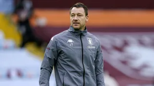 epa08833300 Aston Villa's assistant coach John Terry reacts prior to the English Premier League soccer match between Aston Villa and Brighton Hove Albion in Birmingham, Britain, 21 November 2020. EPA/Tim Keeton/POOL EDITORIAL USE ONLY. No use with unauthorized audio, video, data, fixture lists, club/league logos or 'live' services. Online in-match use limited to 120 images, no video emulation. No use in betting, games or single club/league/player publications./Foto: Tim Keeton/Pool