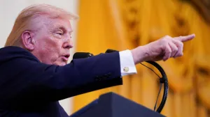U.S. President Donald Trump gestures as he speaks at a Hanukkah reception in the East Room of the White House in Washington, D.C., U.S., December 16, 2025. REUTERS/Nathan Howard/Nathan Howard