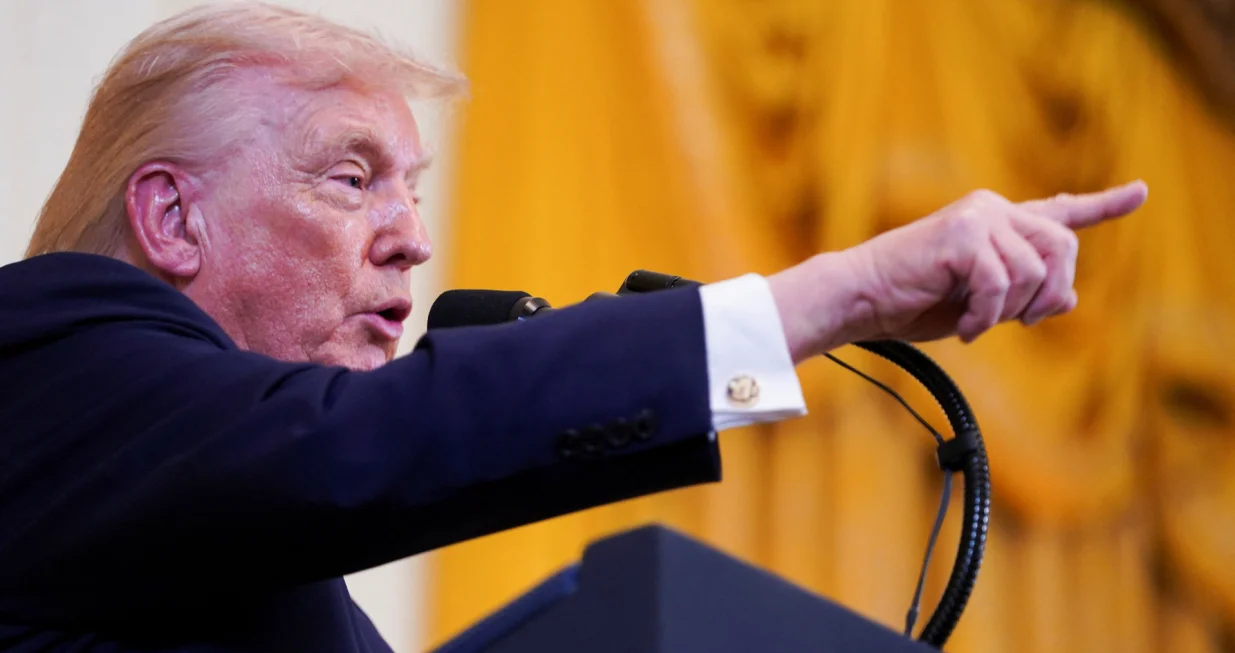 U.S. President Donald Trump gestures as he speaks at a Hanukkah reception in the East Room of the White House in Washington, D.C., U.S., December 16, 2025. REUTERS/Nathan Howard/Nathan Howard