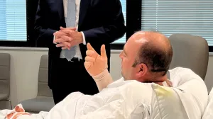 Australia's Prime Minister Anthony Albanese visits Ahmed al Ahmed, the bystander who charged at one of the gunmen and seized his rifle during the deadly shooting at Bondi Beach, at St George Hospital in Sydney, Australia, December 16, 2025. Prime Minister's Office/Handout via REUTERS THIS IMAGE HAS BEEN SUPPLIED BY A THIRD PARTY./Prime Minister's Office