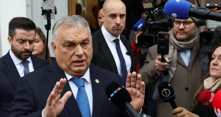 Hungarian Prime Minister Viktor Orban speaks to the media as he arrives at the Patriots for Europe (PfE) party meeting in Brussels, Belgium, December 17, 2025. REUTERS/Yves Herman/Yves Herman