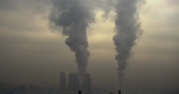 epa10382575 Smoke rises from a factory over the capital Skopje covered by smog and pollution in Skopje, Republic of North Macedonia, 30 December 2022. North Macedonia's citizens are increasingly complaining about health problems caused by poor air quality. Outpatient clinics and hospitals are full of citizens who have respiratory problems. According to IQAir, a Swiss air quality technology company, a week ago, North Macedonia's capital was ranked as the third-most polluted city in the world. The levels of toxic PM10 and PM 2.5 particles in the air measured by IQAir in Skopje were about 28 times higher than the safety threshold established by the World Health Organization. EPA/GEORGI LICOVSKI/Georgi Licovski