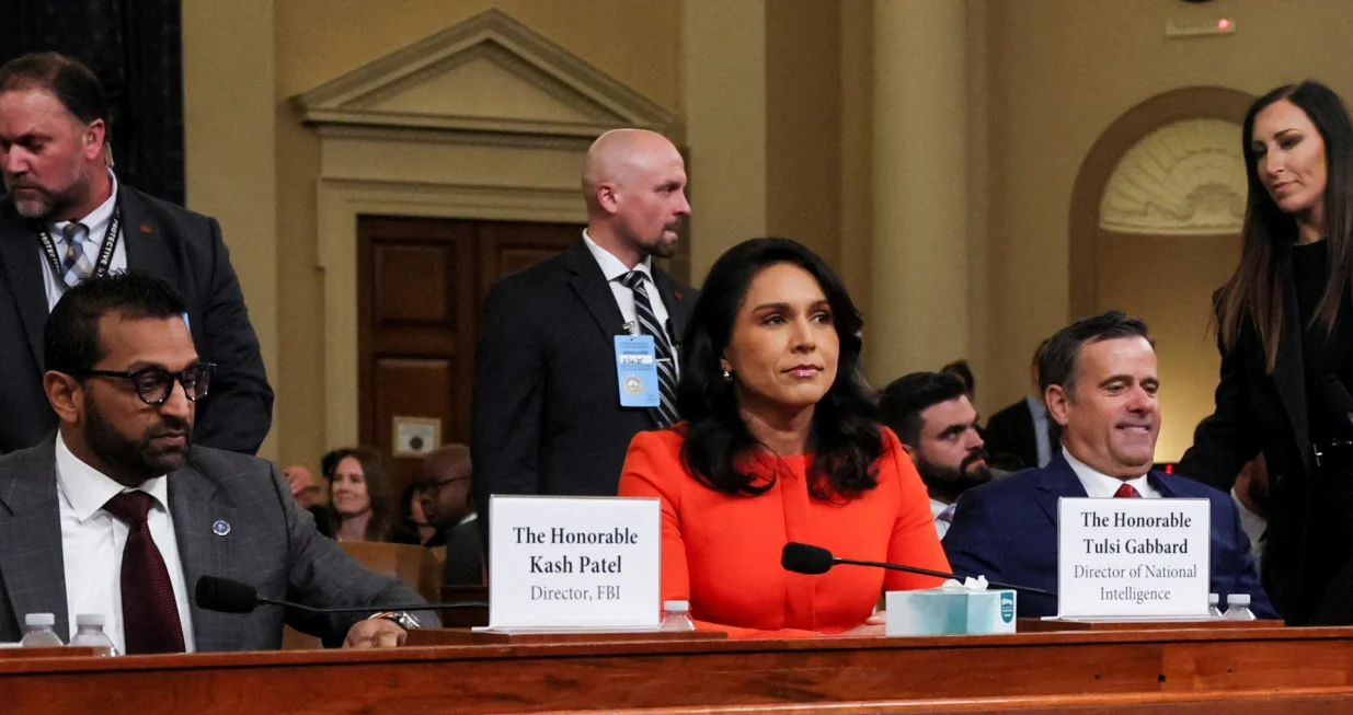 FILE PHOTO: Director of National Intelligence (DNI) Tulsi Gabbard sits next to CIA Director John Ratcliffe and FBI Director Kash Patel, on the day they testify at the House Intelligence Committee hearing about worldwide threats, on Capitol Hill in Washington, D.C., U.S., March 26, 2025. REUTERS/Leah Millis/File Photo/Leah Millis
