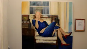 A painting of former U.S. President Bill Clinton wearing a dress is displayed inside the Manhattan home of Jeffrey Epstein in this image from the estate of late financier and convicted sex offender Jeffrey Epstein, released by the Department of Justice in Washington, D.C., U.S., on December 19, 2025. U.S. Justice Department/Handout via REUTERS THIS IMAGE HAS BEEN SUPPLIED BY A THIRD PARTY  TPX IMAGES OF THE DAY  THIS PICTURE WAS PROCESSED BY REUTERS TO ENHANCE QUALITY. AN UNPROCESSED VERSION HAS BEEN PROVIDED SEPARATELY./U.s. Justice Department