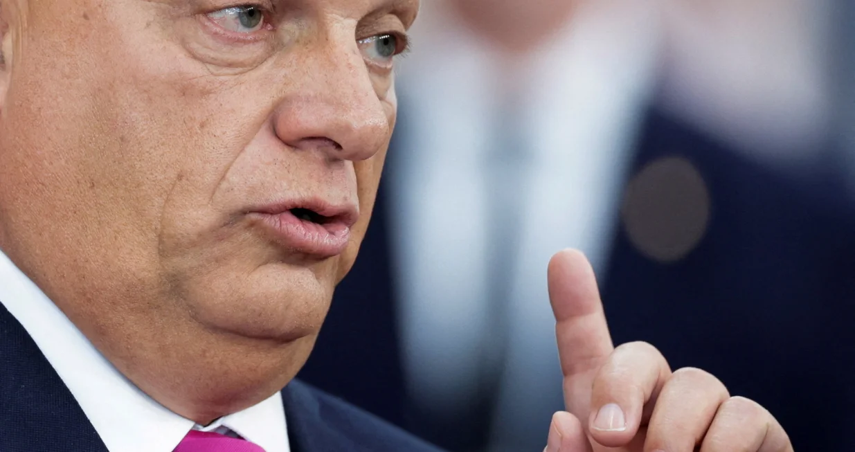 FILE PHOTO: Hungarian Prime Minister Viktor Orban gestures as he speaks to members of the media at the European Political Community summit in Copenhagen, Denmark, October 2, 2025. REUTERS/Leonhard Foeger/File Photo/Leonhard Foeger