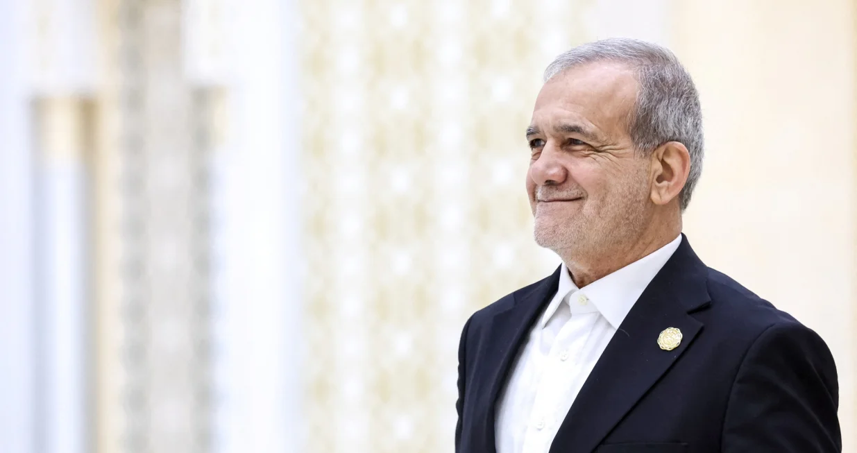 Iranian President Masoud Pezeshkian arrives to attend a plenary session of the International Forum dedicated to the International Year of Peace and Trust, the International Day of Neutrality, and the 30th anniversary of Turkmenistan's neutrality status, at the Congress Centre in Ashgabat, Turkmenistan December 12, 2025. Sputnik/Alexander Kazakov/Pool via REUTERS ATTENTION EDITORS - THIS IMAGE WAS PROVIDED BY A THIRD PARTY./Alexander Kazakov