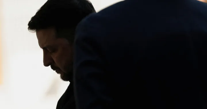 Ukrainian President Volodymyr Zelenskiy reacts as he gets the hall for a minute while he waits for U.S. President Donald Trump for meetings at Trump's Mar-a-Lago club in Palm Beach, Florida, U.S., December 28, 2025. REUTERS/Jonathan Ernst/Jonathan Ernst