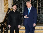 U.S. President Donald Trump speaks next to Ukrainian President Volodymyr Zelenskiy upon his arrival for meetings at Trump's Mar-a-Lago club in Palm Beach, Florida, U.S., December 28, 2025. REUTERS/Jonathan Ernst/Jonathan Ernst