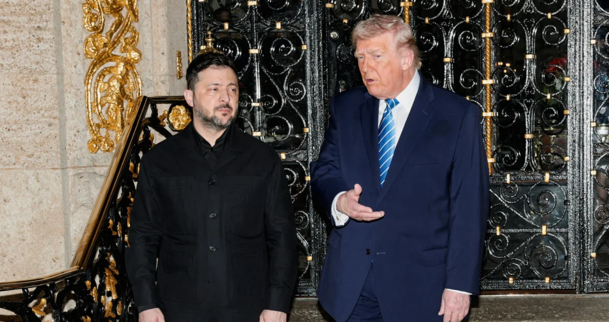 U.S. President Donald Trump speaks next to Ukrainian President Volodymyr Zelenskiy upon his arrival for meetings at Trump's Mar-a-Lago club in Palm Beach, Florida, U.S., December 28, 2025. REUTERS/Jonathan Ernst/Jonathan Ernst