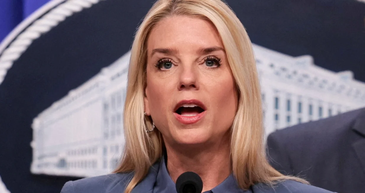 FILE PHOTO: U.S. Attorney General Pam Bondi speaks at a press conference following the arrest in the D.C. pipe bomber investigation, at the Justice Department in Washington, D.C., U.S., December 4, 2025. REUTERS/Jessica Koscielniak/File Photo/Jessica Koscielniak
