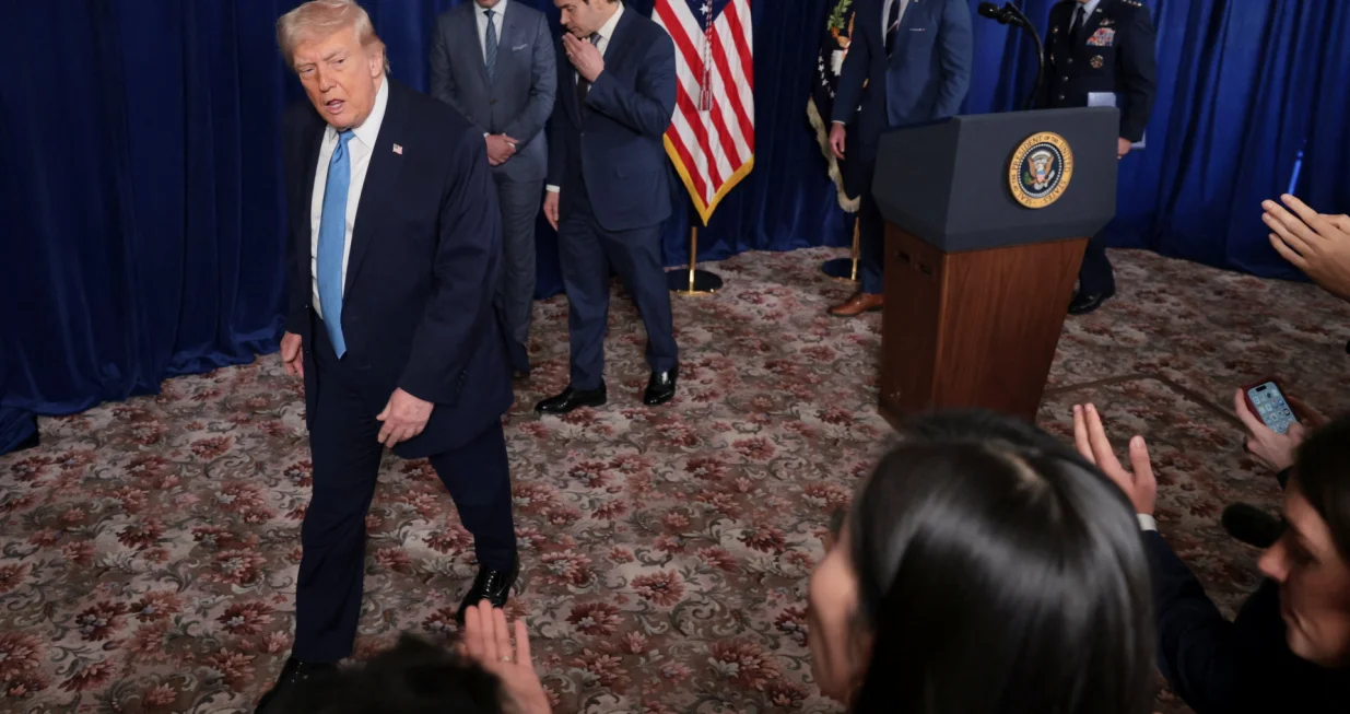 U.S. President Donald Trump, White House Deputy Chief of Staff Stephen Miller, Secretary of State Marco Rubio, General Dan Caine, Chairman of the Joint Chiefs of Staff, and Secretary of Defense Pete Hegseth leave after a press conference following a U.S. strike on Venezuela where President Nicolas Maduro and his wife, Cilia Flores, were captured, from Trump's Mar-a-Lago club in Palm Beach, Florida, U.S., January 3, 2026. REUTERS/Jonathan Ernst/Jonathan Ernst