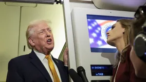 U.S. President Donald Trump speaks to reporters aboard Air Force One en route from Florida to Joint Base Andrews, Maryland, U.S., January 4, 2026. REUTERS/Jonathan Ernst/Jonathan Ernst