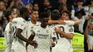 Soccer Football - LaLiga - Real Madrid v Real Betis - Santiago Bernabeu, Madrid, Spain - January 4, 2026 Real Madrid's Gonzalo Garcia celebrates scoring their first goal with Vinicius Junior, Antonio Rudiger, Alvaro Carreras, and teammates REUTERS/Violeta Santos Moura/Foto: Violeta Santos Moura