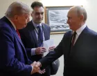 FILE PHOTO: U.S. President Donald Trump shakes hands with Russian President Vladimir Putin before a joint news conference following their meeting at Joint Base Elmendorf-Richardson in Anchorage, Alaska, U.S., August 15, 2025. Sputnik/Gavriil Grigorov/Pool via REUTERS ATTENTION EDITORS - THIS IMAGE WAS PROVIDED BY A THIRD PARTY./File Photo/Gavriil Grigorov