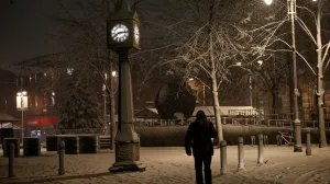 A person walks through the snow as Storm Goretti brings heavy snowfall and rain to Walsall, Britain, January 8, 2026. REUTERS/Isabel Infantes/Isabel Infantes