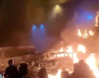 Protesters gather as vehicles burn, amid evolving anti-government unrest, in Tehran, Iran, in this screen grab obtained from a social media video released on January 9, 2026. Social Media/via REUTERS THIS IMAGE HAS BEEN SUPPLIED BY A THIRD PARTY. NO RESALES. NO ARCHIVES. REFILE - QUALITY REPEAT VERIFICATION: - Buildings, business signage and traffic light matched file and satellite imagery - Date not verified - Witnesses told Reuters protesters gathered in the streets on Thursday (January 8)/Social Media