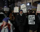 Demonstrators shout slogans during a demonstration against increased immigration enforcement, days after the fatal shooting of Renee Nicole Good by a U.S. Immigration and Customs Enforcement (ICE) agent, outside the Canopy by Hilton hotel that demonstrators believe is being used by federal agents, in Minneapolis, Minnesota, U.S., January 9, 2026. REUTERS/Tyrone Siu/Tyrone Siu