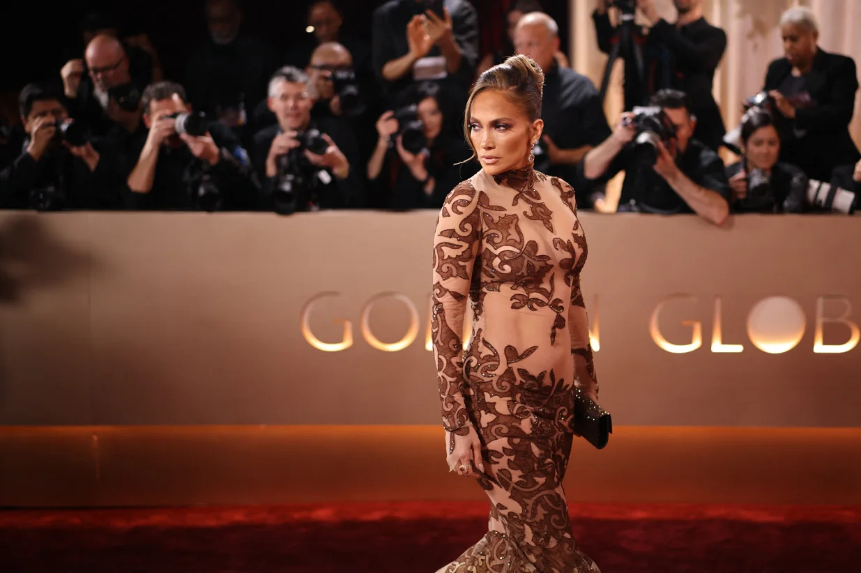 Jennifer Lopez poses on the red carpet at the 83rd Annual Golden Globes in Beverly Hills, California, U.S., January 11, 2026. REUTERS/Daniel Cole/Daniel Cole