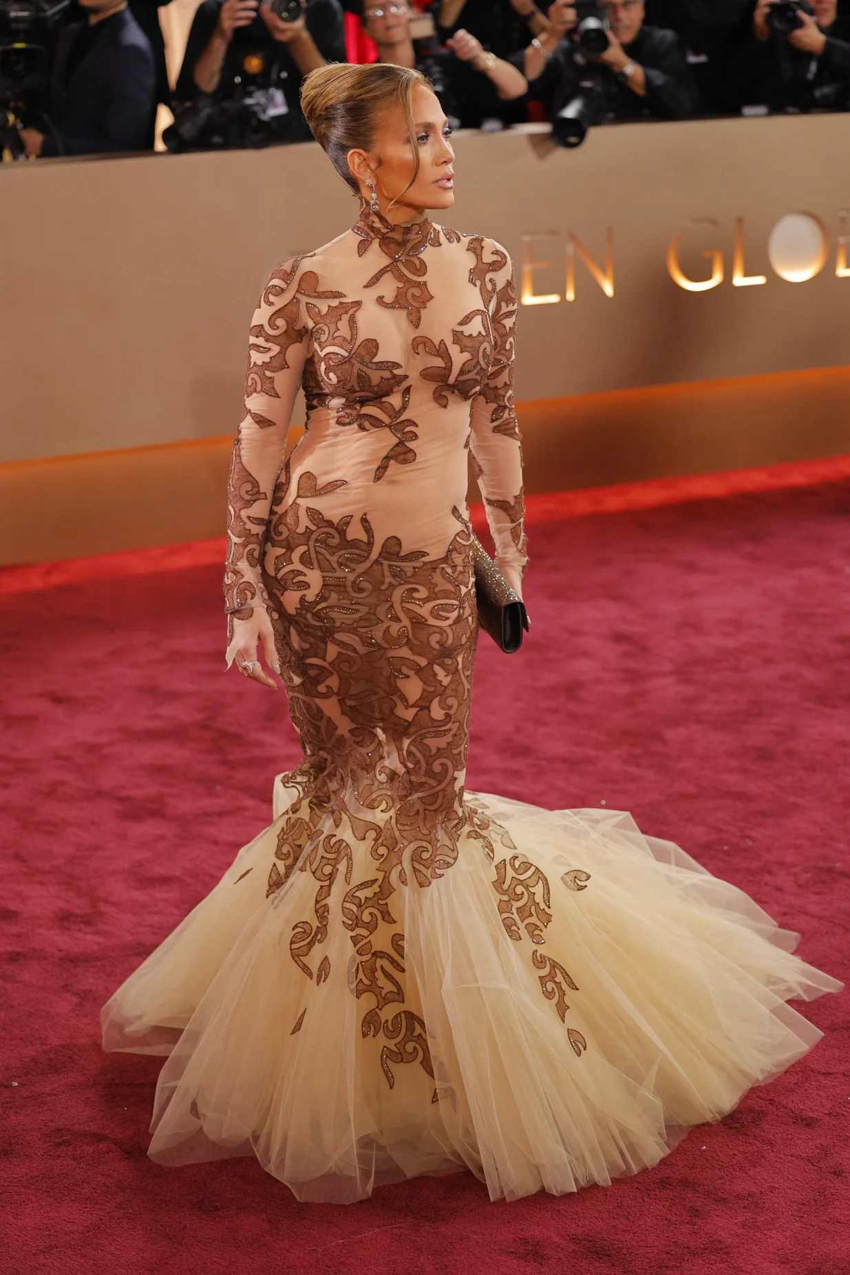 Jennifer Lopez poses on the red carpet at the 83rd Annual Golden Globes in Beverly Hills, California, U.S., January 11, 2026. REUTERS/Mike Blake/Mike Blake