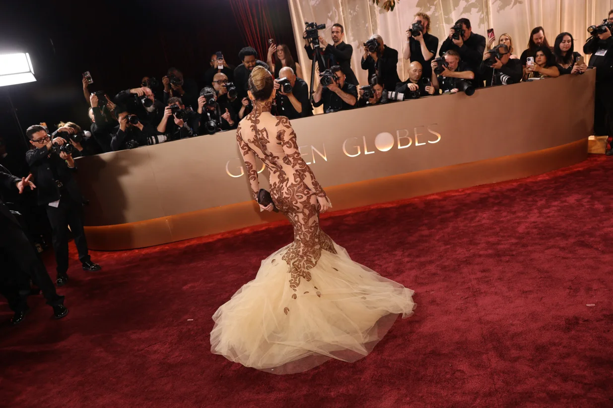 Jennifer Lopez poses on the red carpet at the 83rd Annual Golden Globes in Beverly Hills, California, U.S., January 11, 2026. REUTERS/Daniel Cole/Daniel Cole