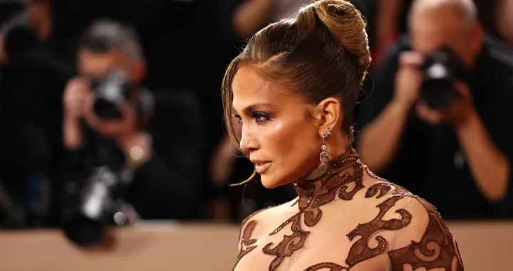 Jennifer Lopez poses on the red carpet at the 83rd Annual Golden Globes in Beverly Hills, California, U.S., January 11, 2026. REUTERS/Daniel Cole/Daniel Cole