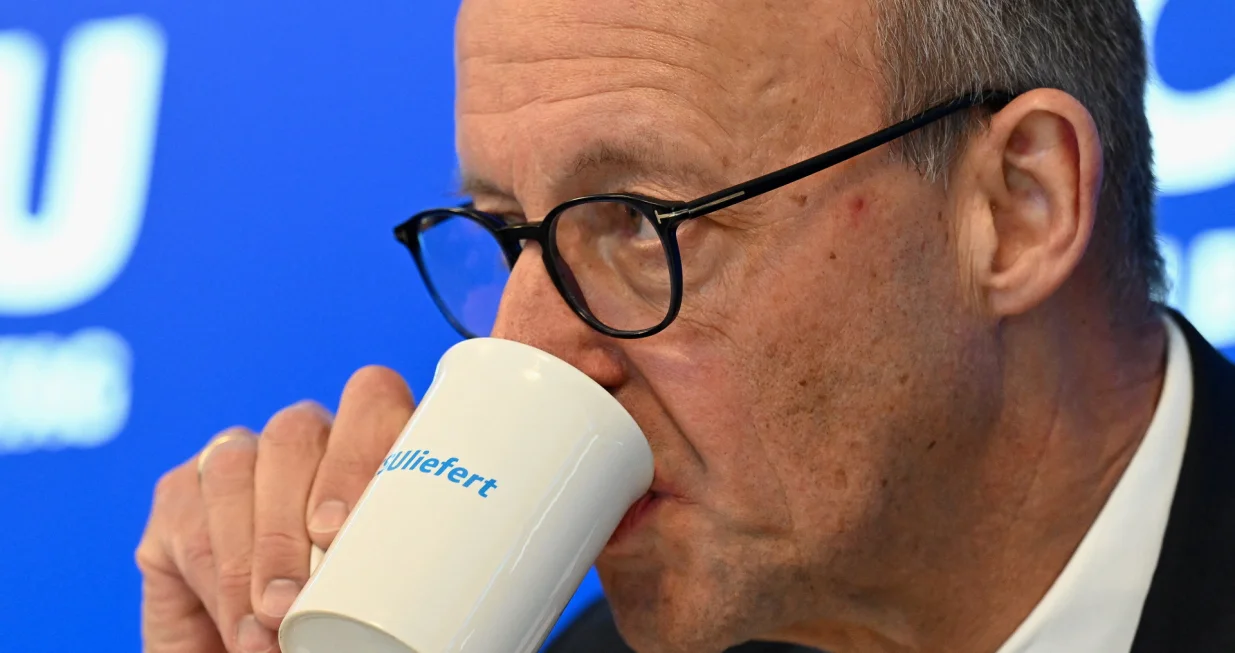 Christian Democratic Union (CDU) leader and German Chancellor Friedrich Merz drinks during the annual retreat of CSU federal lawmakers in the former monastery in Seeon, Germany, January 8, 2026. REUTERS/Angelika Warmuth/Angelika Warmuth