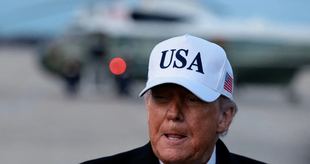 FILE PHOTO: U.S. President Donald Trump speaks to reporters, on his return from Detroit, Michigan, at Joint Base Andrews, Maryland, U.S., January 13, 2026. REUTERS/Evelyn Hockstein/File Photo/Evelyn Hockstein