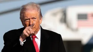 U.S. President Donald Trump gestures, before boarding Air Force One en route to Detroit, Michigan, at Joint Base Andrews, Maryland, U.S., January 13, 2026. REUTERS/Evelyn Hockstein/Evelyn Hockstein