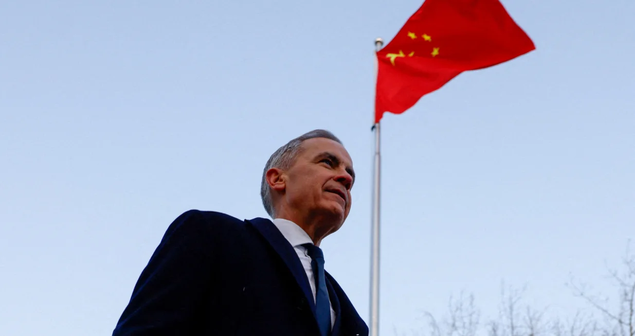 Canada's Prime Minister Mark Carney walks at Ritan Park, during the first visit by a Canadian prime minister to China since 2017, in Beijing, China, January 16, 2026. REUTERS/Carlos Osorio  TPX IMAGES OF THE DAY/Carlos Osorio