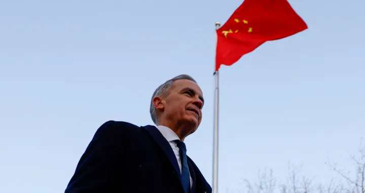 Canada's Prime Minister Mark Carney walks at Ritan Park, during the first visit by a Canadian prime minister to China since 2017, in Beijing, China, January 16, 2026. REUTERS/Carlos Osorio  TPX IMAGES OF THE DAY/Carlos Osorio