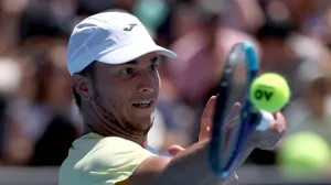 Tennis - Australian Open - Melbourne Park, Melbourne, Australia - January 18, 2026 Serbia's Miomir Kecmanovic in action during his first round match against Argentina's Tomas Martin Etcheverry REUTERS/Edgar Su/Foto: Edgar Su
