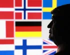 A 3D-printed miniature model of U.S. President Donald Trump and flags of eight European countries potentially facing U.S. tariffs after Trump said he may put a tariff on countries that do not support his plan for the United States to control Greenland, in this illustration taken January 17, 2026. REUTERS/Dado Ruvic/Illustration/Dado Ruvic