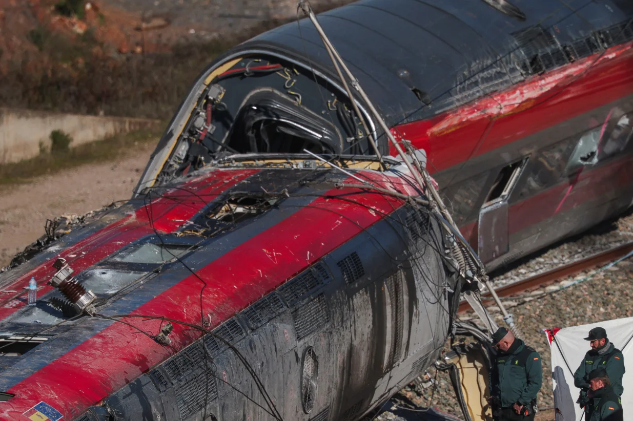Members of the Spanish Civil Guard work next to one of the trains&nbsp;involved in the accident, at the site of a deadly derailment of two high-speed trains near Adamuz, in Cordoba, Spain, January 19, 2026. REUTERS/Susana Vera/Susana Vera