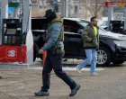 A U.S. Immigration and Customs Enforcement agent walks back to his vehicle after a stop at a gas station convenience store, after an ICE agent fatally shot Renee Nicole Good, in Minneapolis, Minnesota, U.S., January 19, 2026. REUTERS/Brian Snyder/Brian Snyder
