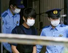 Tetsuya Yamagami, suspected of killing former Japanese premier Shinzo Abe, is escorted by police officers as he is taken to prosecutors, at Nara-nishi police station in Nara, western Japan, in this photo taken by Kyodo July 10, 2022. Mandatory credit Kyodo via REUTERS ATTENTION EDITORS - THIS IMAGE WAS PROVIDED BY A THIRD PARTY. MANDATORY CREDIT. JAPAN OUT. NO COMMERCIAL OR EDITORIAL SALES IN JAPAN. NO RESALES. NO ARCHIVES/Kyodo