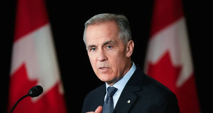 Canada's Prime Minister Mark Carney speaks during a news conference before a cabinet planning forum at the Citadelle in Quebec City, Quebec, Canada January 22, 2026. REUTERS/Mathieu Belanger/Mathieu Belanger