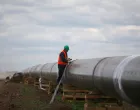 FILE PHOTO: A worker is seen next to a pipe at a construction site on the extension of Russia's TurkStream gas pipeline after a visit of Serbia's President Aleksandar Vucic and Bulgaria's Prime Minister Boyko Borissov, in Letnitsa, Bulgaria, June 1, 2020. REUTERS/ Stoyan Nenov//File Photo/Stoyan Nenov