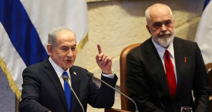 Israeli Prime Minister Benjamin Netanyahu speaks at the plenum of the Knesset, next to Albania's Prime Minister Edi Rama, in Jerusalem, January 26, 2026. REUTERS/Ronen Zvulun/Ronen Zvulun