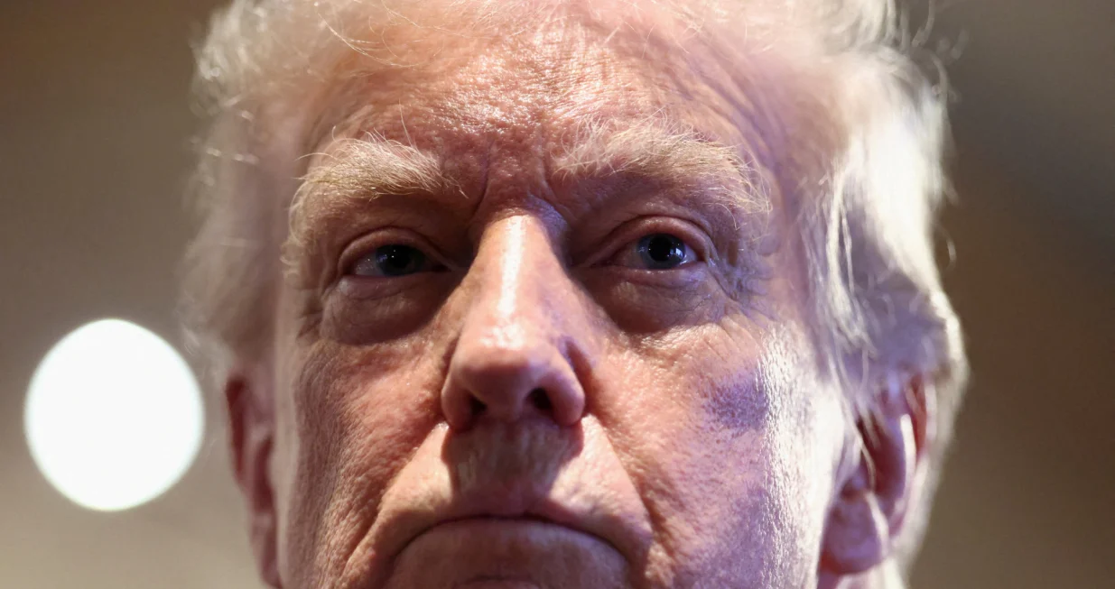 U.S. President Donald Trump looks on as he visits Machine Shed restaurant in Urbandale, Iowa, U.S., January 27, 2026. REUTERS/Kevin Lamarque  TPX IMAGES OF THE DAY/Kevin Lamarque