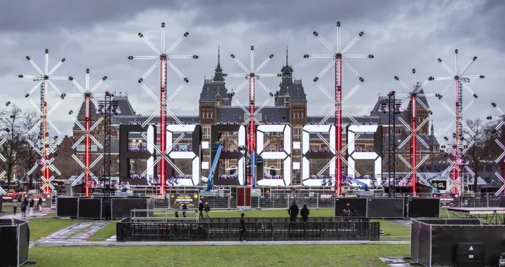 epa10381605 Preparations for the light and fireworks show are uderway on the Museumplein in Amsterdam, The Netherlands, 29 December 2022. The municipality organizes two fireworks shows in the capital during the turn of the year. Amsterdam has a general ban on lighting consumer fireworks. EPA/EVA PLEVIER/Eva Plevier