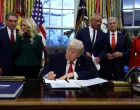 U.S. President Donald Trump, flanked by Health and Human Services (HHS) Secretary Robert F. Kennedy Jr., Administrator of the Centers for Medicare and Medicaid Services Mehmet Oz, Secretary of the Interior Doug Burgum and his wife Kathryn Burgum, signs an executive order for the "Great American Recovery Initiative" to coordinate a federal government response to drug addiction and substance abuse, in the Oval Office of the White House in Washington, D.C., January 29, 2026. REUTERS/Kevin Lamarque/Kevin Lamarque