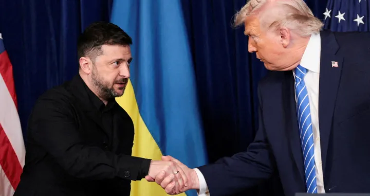 FILE PHOTO: U.S. President Donald Trump and Ukrainian President Volodymyr Zelenskiy shake hands during a press conference after their lunch meeting at Trump's Mar-a-Lago club, in Palm Beach, Florida, U.S., December 28, 2025. REUTERS/Jonathan Ernst/File Photo/Jonathan Ernst