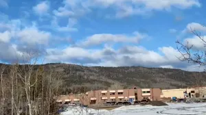 Vehicles are parked outside the Tumbler Ridge Secondary School, the site of a deadly mass shooting in Tumbler Ridge, British Columbia, Canada, February 10, 2026, in this screengrab obtained from a social media video. Trent Ernst/Tumbler RidgeLines/via REUTERS THIS IMAGE HAS BEEN SUPPLIED BY A THIRD PARTY. MANDATORY CREDIT. NO RESALES. NO ARCHIVES.  TPX IMAGES OF THE DAY  VERIFICATION: Reuters was able to confirm the location of the video as the middle school, roadmap layout and residential buildings matched with file and satellite images. Reuters was able to confirm the date of the video as they were livestreamed. Local police confirmed ten people are dead including the shooter at a high school in Tumbler Ridge on Tuesday (February 10)/Trent Ernst/tumbler Ridgelines