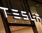 epa08763834 (FILE) - A Tesla logo is seen in a showroom in Berlin, Germany, 13 November 2019 (reissued 22 October 2020). On 21 October Tesla reported a profit of 331 million US dollar in the third quarter (Q3) of 2020, more than double the profit of Q3 in 2019. EPA/FELIPE TRUEBA/Felipe Trueba