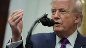 U.S. President Donald Trump makes an announcement on the repeal of a scientific finding that greenhouse gas emissions endanger human health, removing the legal basis for federal climate regulations, at the White House in Washington, D.C., U.S., February 12, 2026. REUTERS/Jonathan Ernst/Jonathan Ernst