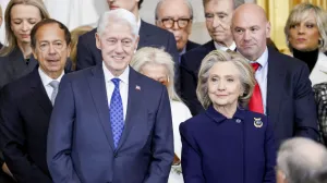 FILE PHOTO: Former U.S. President Bill Clinton and former U.S. Secretary of State Hillary Clinton arrive for Donald Trump's inauguration as the next President of the United States in the Rotunda of the United States Capitol in Washington, U.S., January 20, 2025. SHAWN THEW/POOL/Pool via REUTERS/File Photo/Shawn Thew/pool