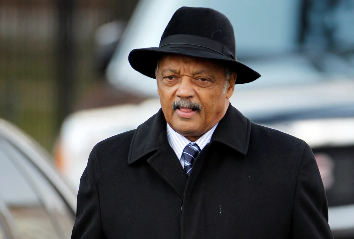 FILE PHOTO: Reverend Jesse Jackson departs the funeral for Whitney Houston at the New Hope Baptist Church in Newark, New Jersey February 18, 2012.  REUTERS/Carlo Allegri/File Photo/Carlo Allegri