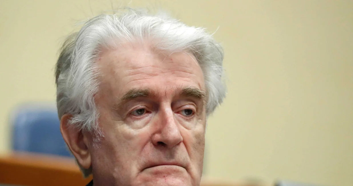 epa08529984 (FILE) - Former Bosnian Serb leader Radovan Karadzic appears in a courtroom before the International Residual Mechanism for Criminal Tribunals (MICT), which handles outstanding war crimes cases for the Balkans and Rwanda, in The Hague, The Netherlands, 24 April 2018 (reissued 06 July 2020). A quarter of a century ago, the world witnessed the worst mass murder on European soil since World War II. Some 7,000-8,000 Bosniaks were slaughtered and 20,000 civilians were forcibly displaced in an act of ethnic cleansing perpetrated in the small eastern Bosnian village of Srebrenica, whose name will forever be linked to the infamous 1995 massacre. Today, 25 years after the massacre, the memory of its victims is kept alive by several institutions, such as the Museum of Crimes Against Humanity and Genocide in Sarajevo or a permanent exhibit at the 'Memorial Center Srebrenica-Potocari' that now occupies the former headquarters of the Dutch UNPROFOR Battalion. EPA/YVES HERMAN/POOL ATTENTION: This Image is part of a PHOTO SET/Yves Herman/Pool